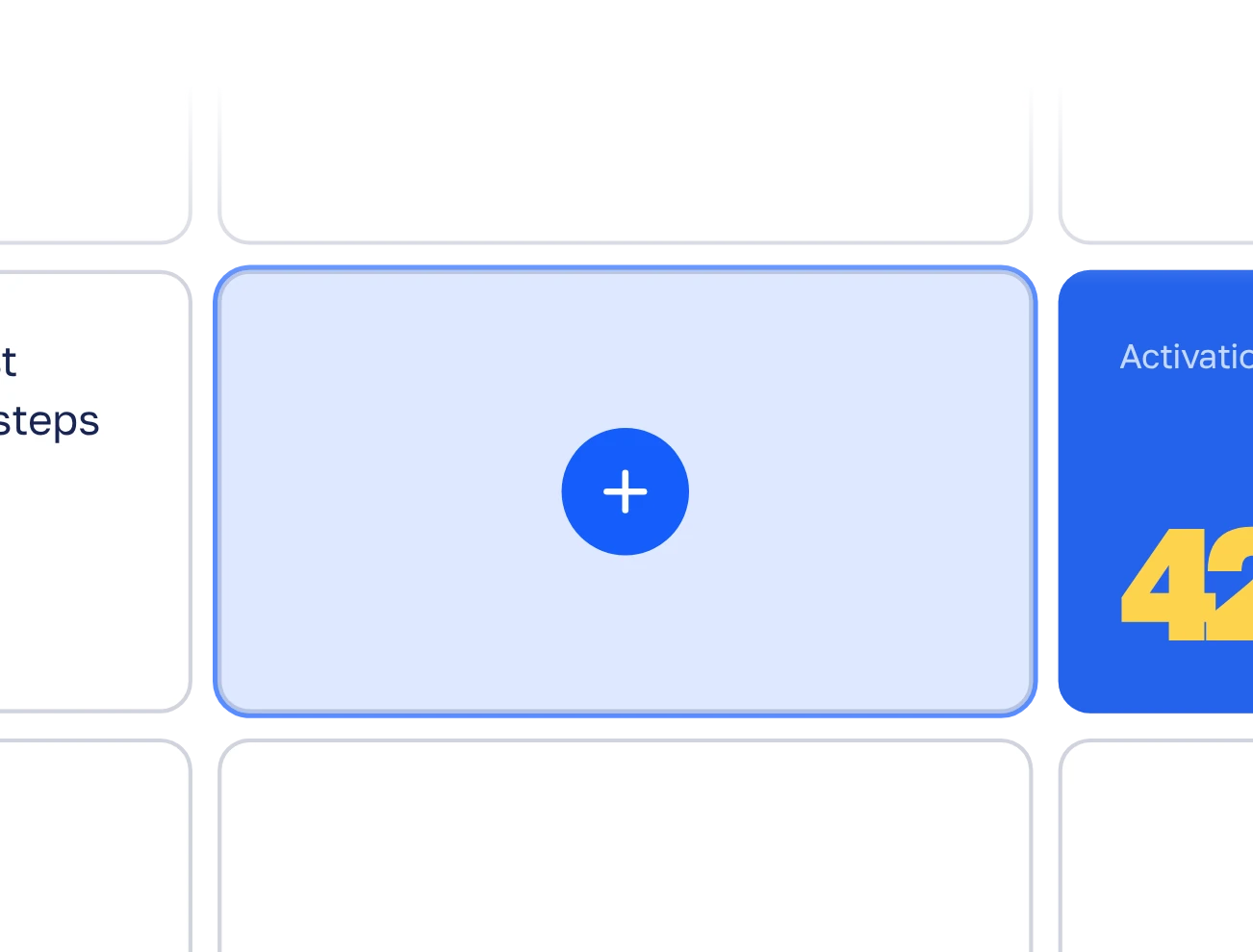 The slide grid close up: an empty cell with a plus in the middle, other blocks in the cells on both sides